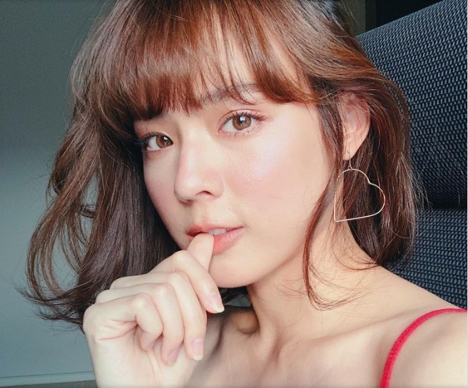 Kiểu tóc xoăn ngắn 7